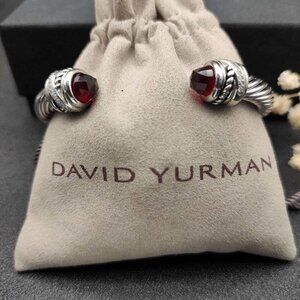 Sterling and gold David Yurman twisted cable cuff bracelet with garnet stones
